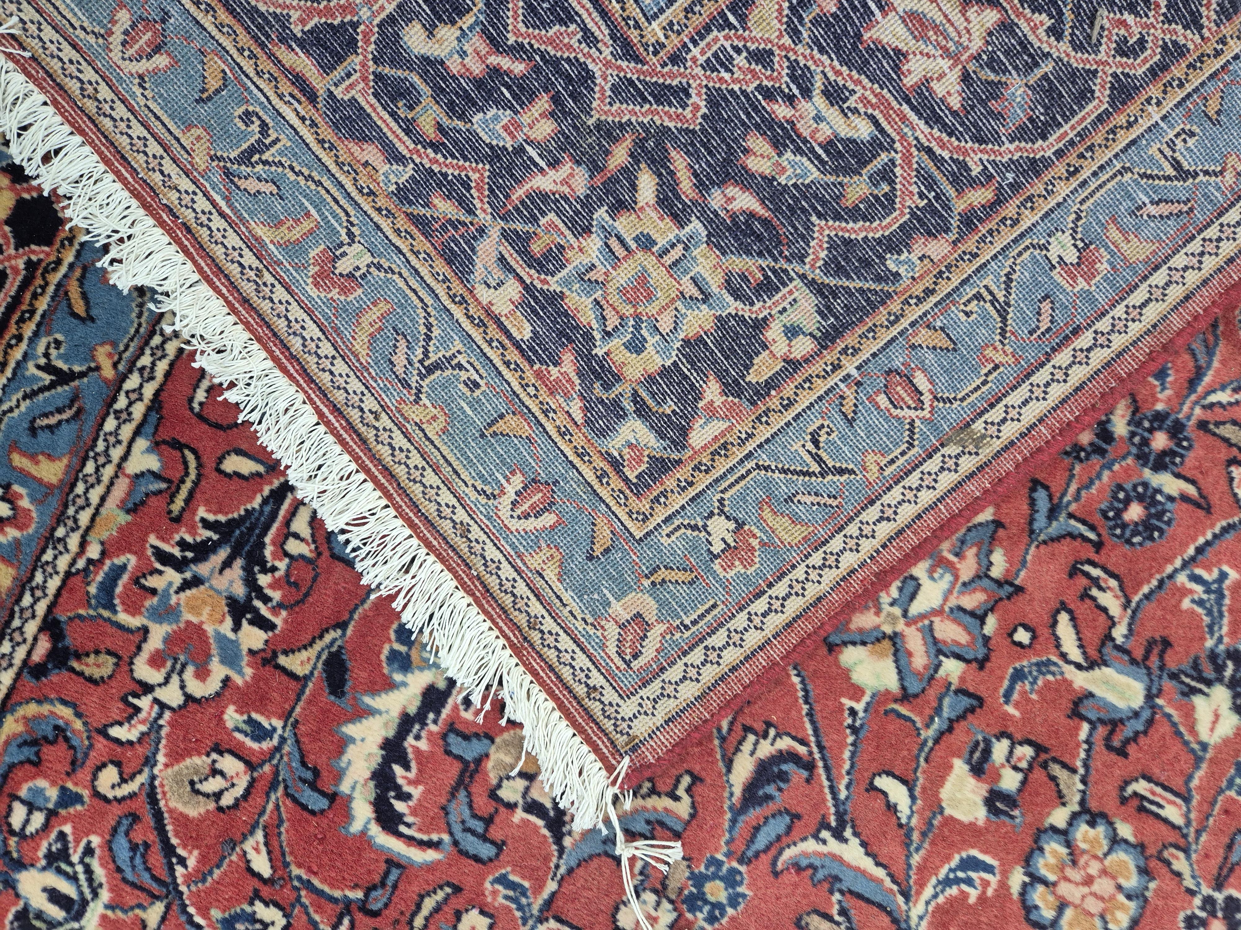 A Sarough brick red ground carpet, 340 x 250cm. Condition - good